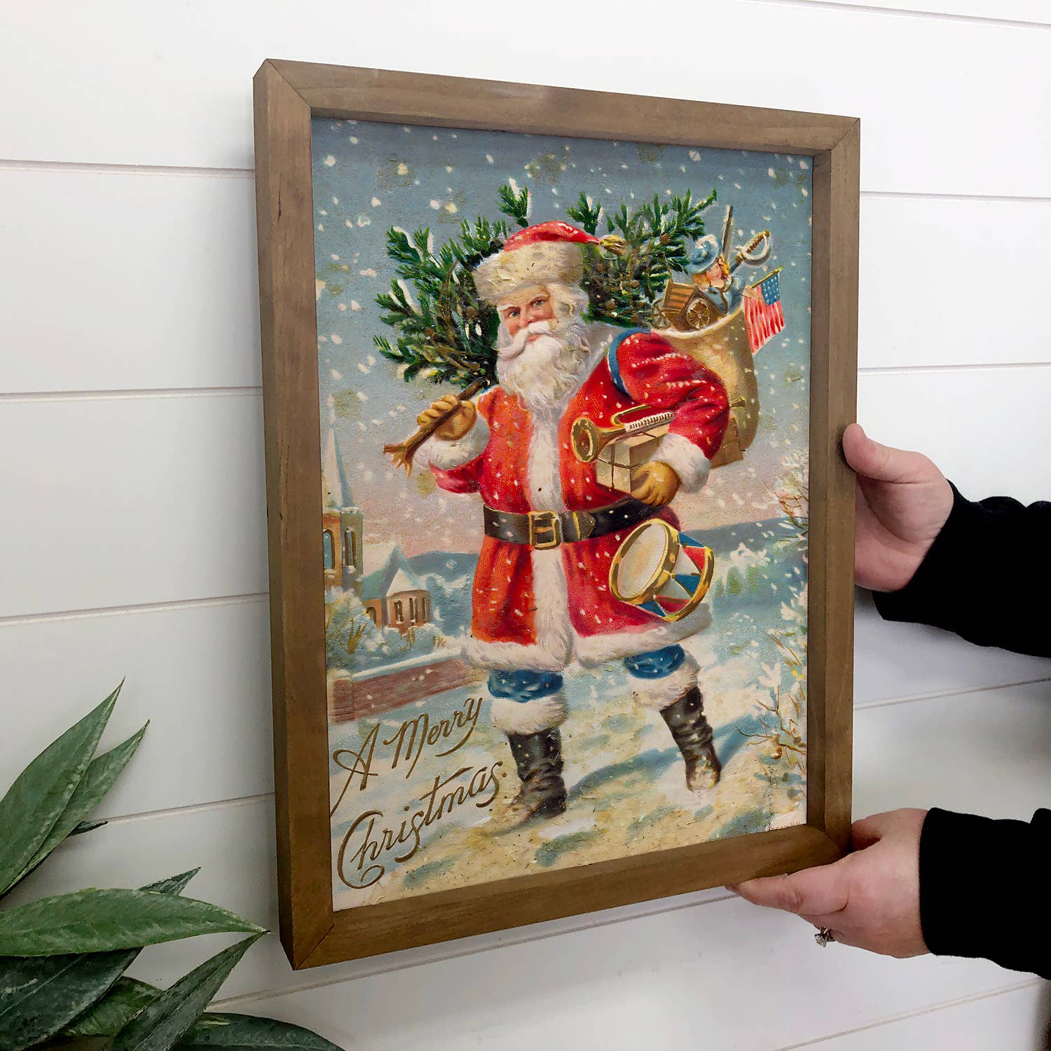 Santa Carrying Tree - Framed Holiday Canvas Art - Wall Art