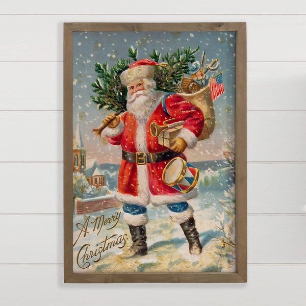 Santa Carrying Tree - Framed Holiday Canvas Art - Wall Art