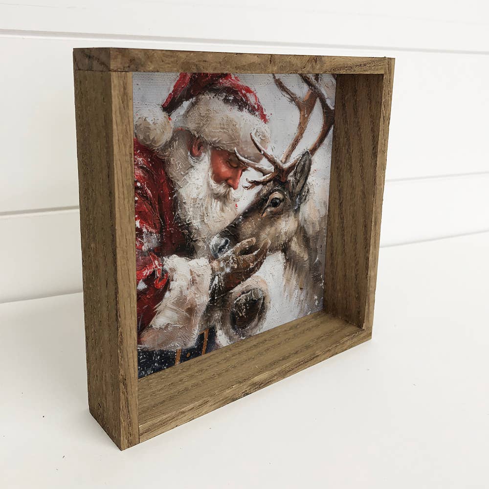 Santa Holding Reindeer - Santa Canvas Art - Wood Framed Art