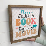 Never Judge a Book by It's Movie - Funny Word Sign - Canvas