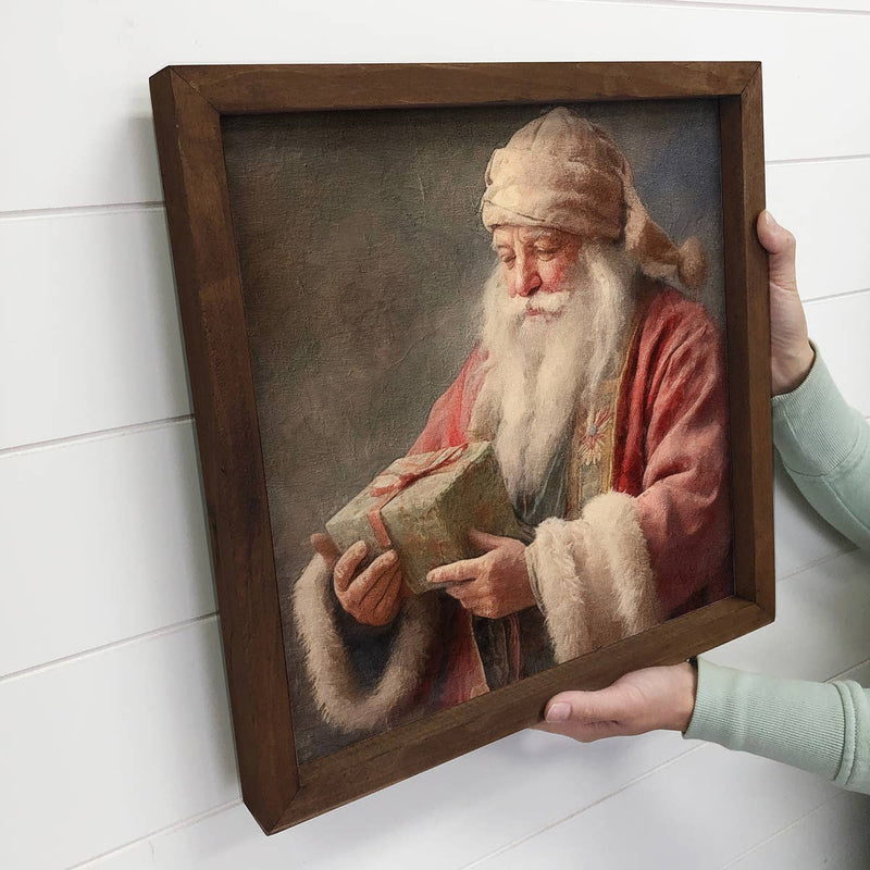 Vintage Santa Holding Gift - Rustic Holiday Canvas Wall Art